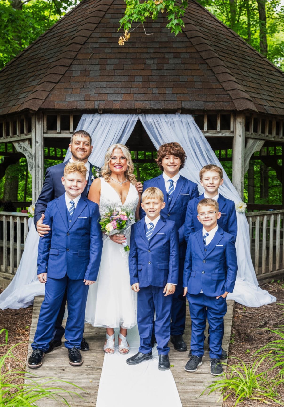 Jared Duncan with his wife Joanna and their five sons